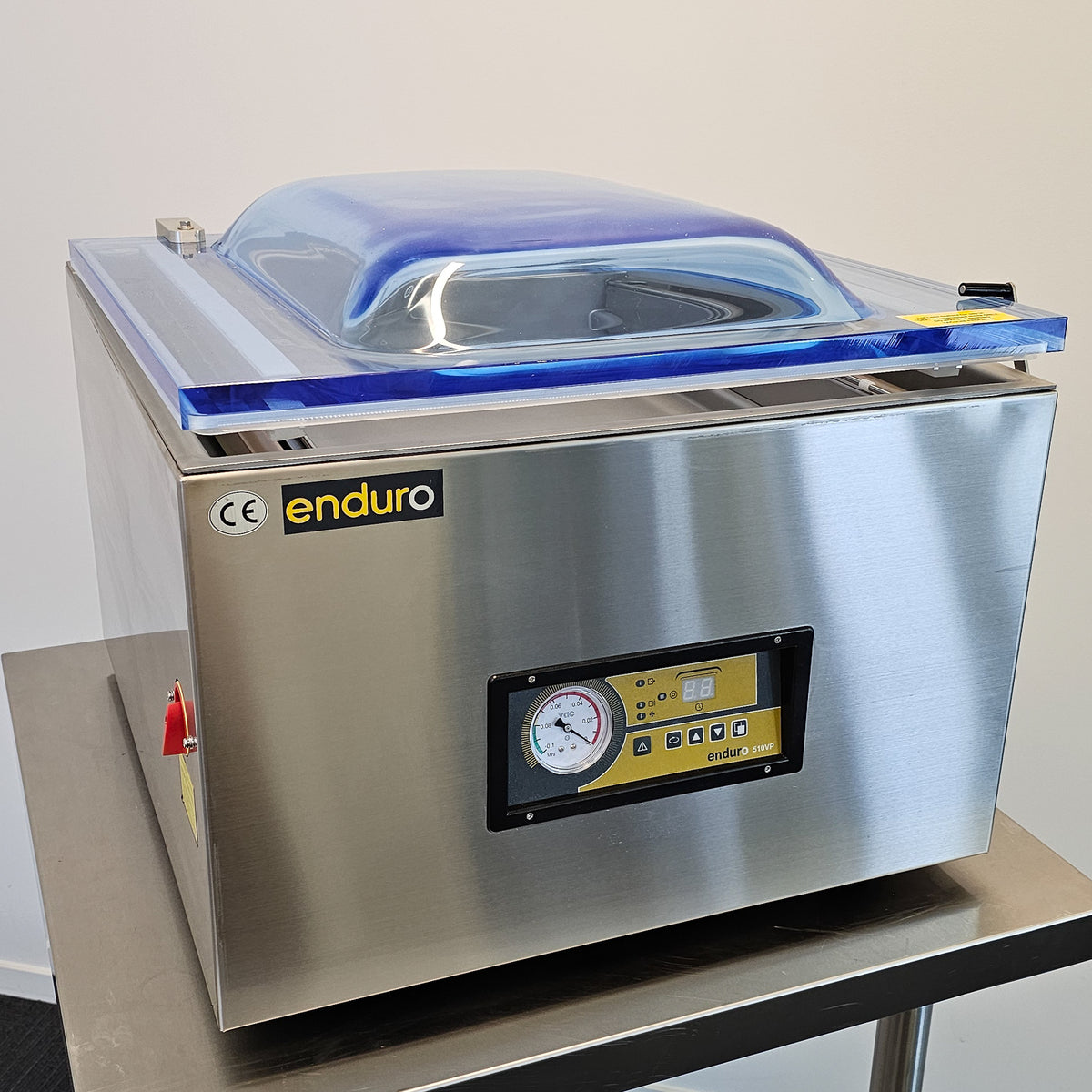 Stainless steel vacuum chamber with 'enduro' branding on a white background
