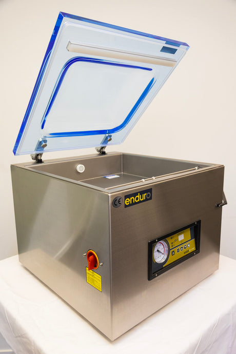 Stainless steel vacuum chamber with 'endur' branding on a white background
