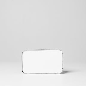 A silver foil lid placed on a flat surface, designed to fit a crinklewall tray.